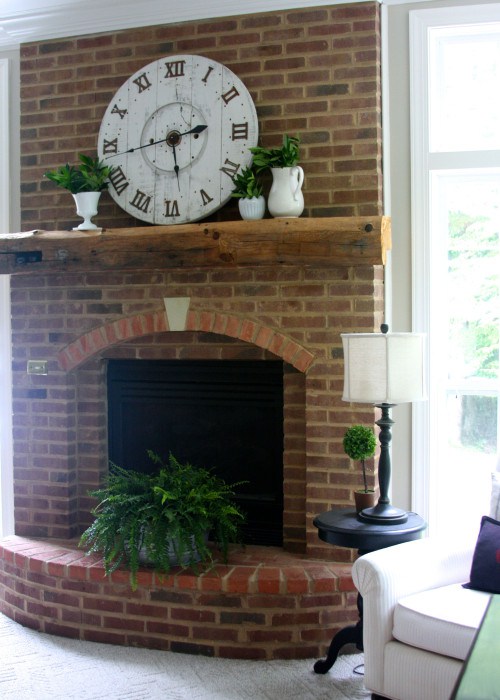 DIY-Spool-Clock-above-fireplace-e1436879818365 (1)