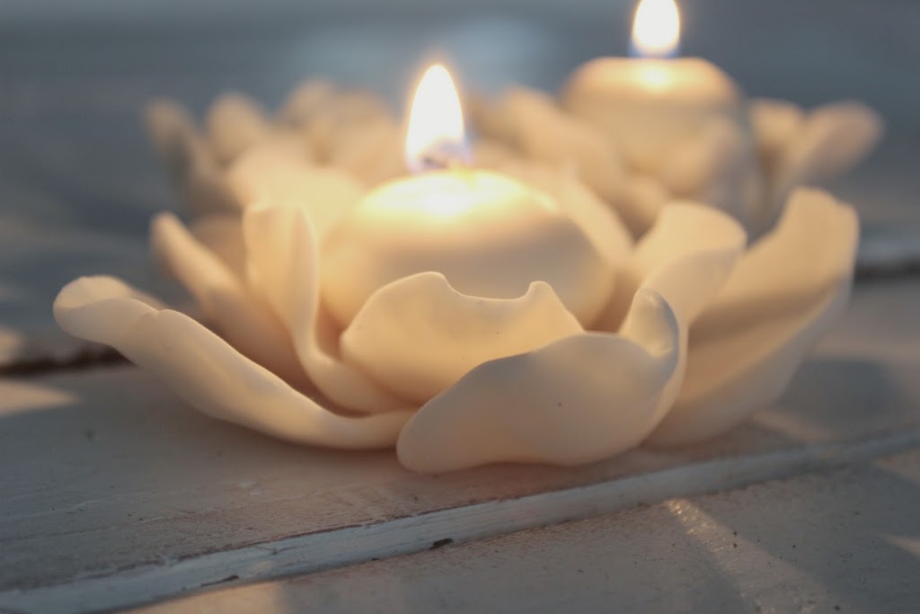 Escaping through art cold porcelain tea light holder