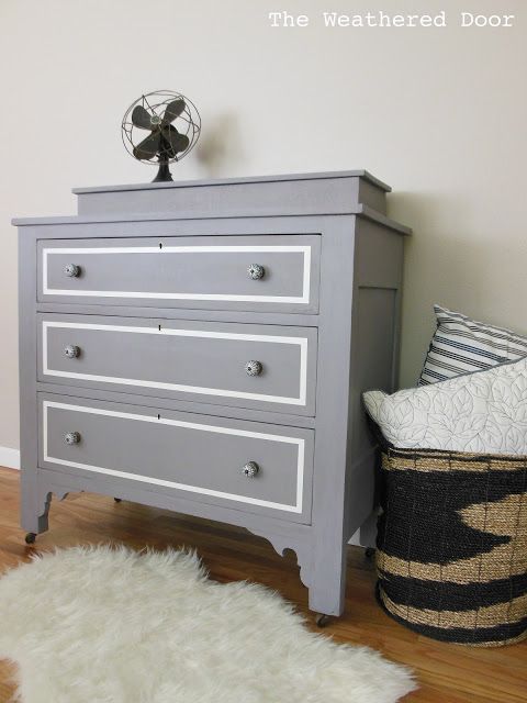 A plum-grey dresser with modern lines
