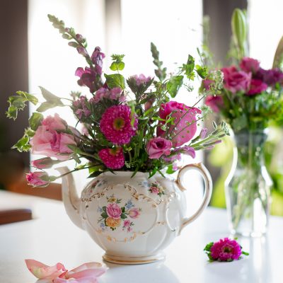 Romantic Flower Arrangement in Antique Teapot